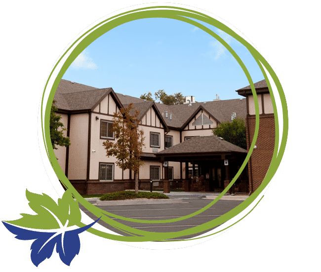 exterior of sharmar village with decorative green leaf circle detail