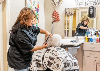 Resident getting hair done